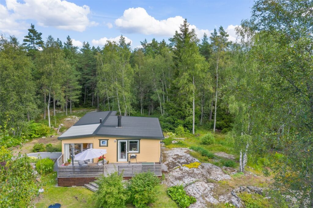 Målning av fasad till villaägare. Bromma Äppelviken